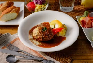 自家製メンチカツとデミグラスソース_洋食堂なか田公式HPより